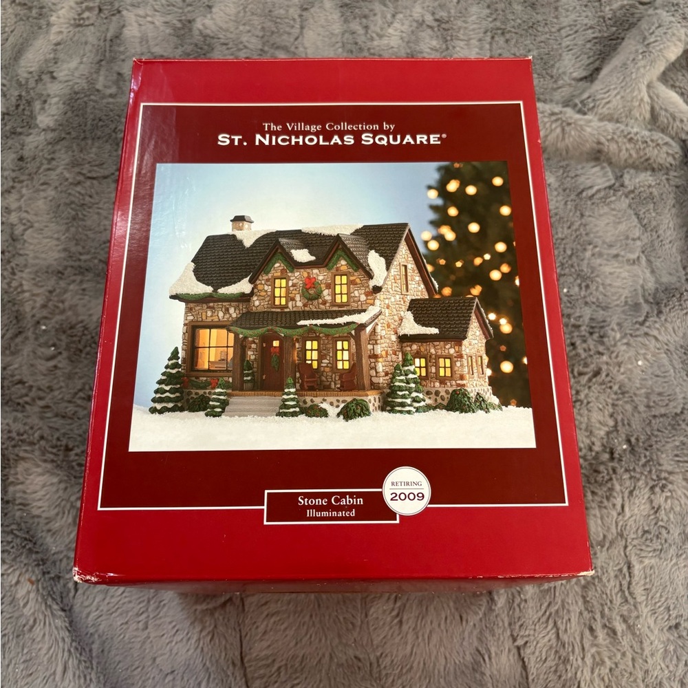 The Village Collection St. Nicholas Square Stone Cabin Light Up Christmas